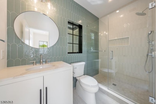 338 Old Short Hills Rd, Millburn Twp, NJ 07078 - full bathroom with tile walls, a stall shower, vanity, and tile patterned floors