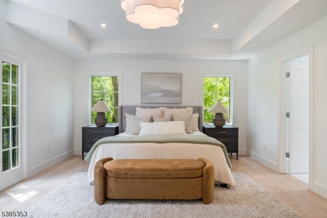 338 Old Short Hills Rd, Millburn Twp, NJ 07078 - bedroom with multiple windows, light wood-style floors, a chandelier, and recessed lighting