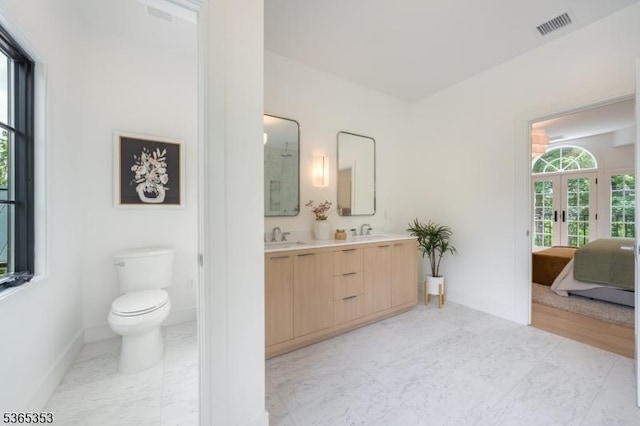 338 Old Short Hills Rd, Millburn Twp, NJ 07078 - bathroom featuring french doors, double vanity, and connected bathroom
