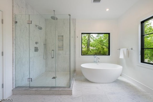 338 Old Short Hills Rd, Millburn Twp, NJ 07078 - bathroom with a stall shower, a soaking tub, and marble look tile flooring