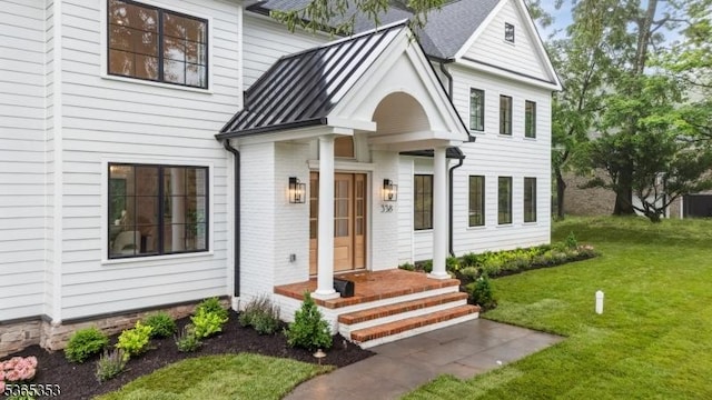 338 Old Short Hills Rd, Millburn Twp, NJ 07078 - view of front facade featuring a standing seam roof, a front lawn, and a metal roof