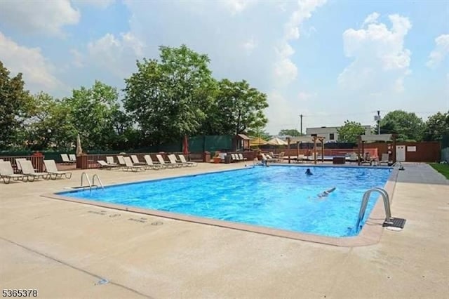 201 Saint Pauls Ave Unit 7M, Jersey City, NJ 07306 - community pool with a patio