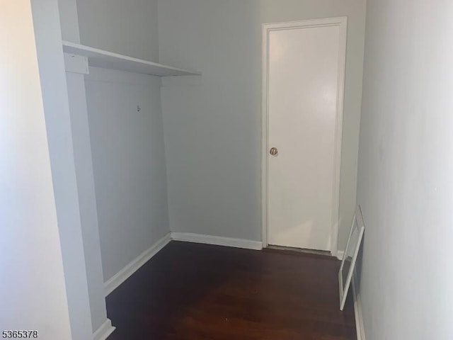 201 Saint Pauls Ave Unit 7M, Jersey City, NJ 07306 - washroom with dark wood-type flooring and baseboards