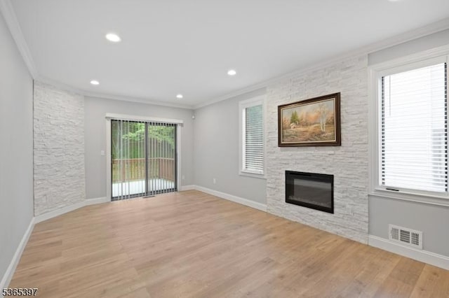 46 Overlook Dr Unit 46, Independence Twp, NJ 07840 - unfurnished living room featuring crown molding, a stone fireplace, light wood finished floors, and recessed lighting