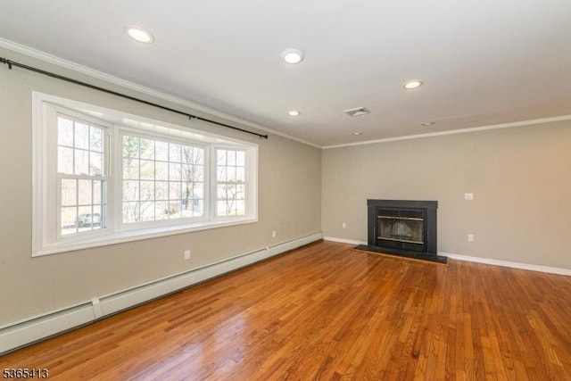 9 Hilary Ct, Vernon Twp, NJ 07460 - unfurnished living room with a baseboard radiator, ornamental molding, recessed lighting, wood finished floors, and a glass covered fireplace