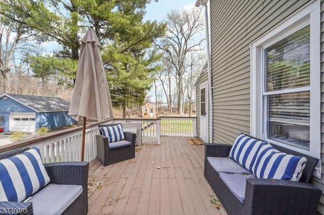 699 Riverview Dr, Totowa Boro, NJ 07512 - deck featuring an outdoor structure and an outdoor living space
