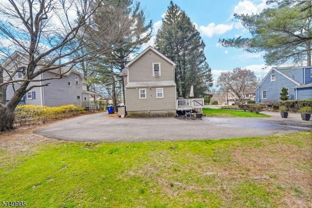 699 Riverview Dr, Totowa Boro, NJ 07512 - back of house with a lawn and a wooden deck