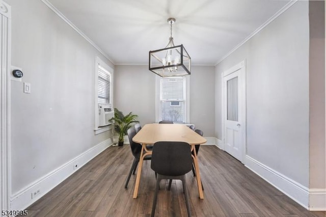 699 Riverview Dr, Totowa Boro, NJ 07512 - dining area with a chandelier, dark wood-type flooring, and ornamental molding