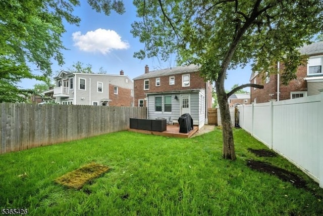 356 Raleigh Rd, Rahway City, NJ 07065 - back of property with a fenced backyard and outdoor lounge area