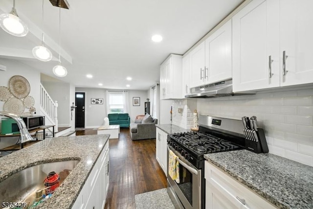 356 Raleigh Rd, Rahway City, NJ 07065 - kitchen featuring appliances with stainless steel finishes, open floor plan, recessed lighting, white cabinets, and decorative backsplash