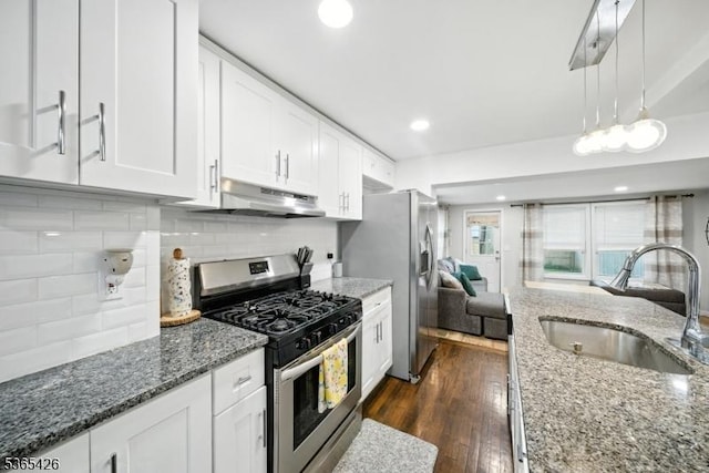 356 Raleigh Rd, Rahway City, NJ 07065 - kitchen with appliances with stainless steel finishes, white cabinetry, under cabinet range hood, stone countertops, and recessed lighting