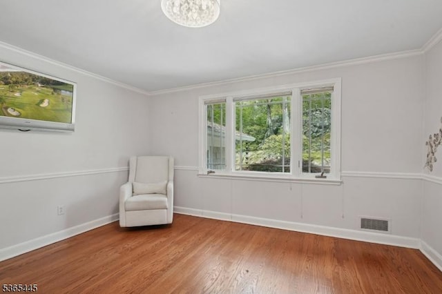 8 Hornbeam Ln, Kinnelon Boro, NJ 07405 - unfurnished room featuring wood finished floors, ornamental molding, and a chandelier
