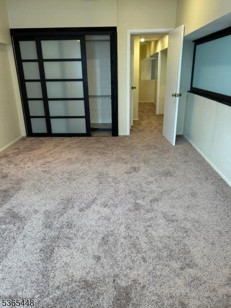 111 Mulberry St Unit 4R, Newark City, NJ 07102 - unfurnished bedroom featuring carpet and a closet