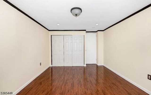 111 Mulberry St Unit 4R, Newark City, NJ 07102 - unfurnished bedroom featuring crown molding, wood finished floors, a closet, and recessed lighting
