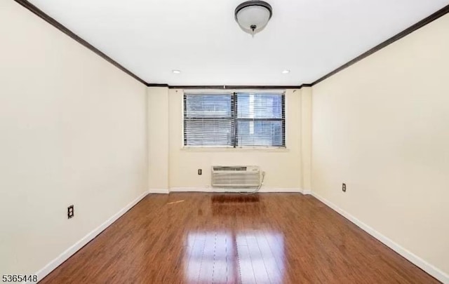 111 Mulberry St Unit 4R, Newark City, NJ 07102 - unfurnished room with ornamental molding, wood finished floors, and an AC wall unit