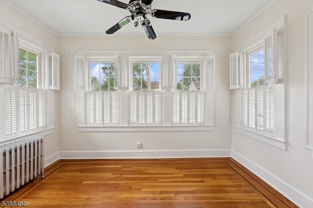 582 Pierson St, Westfield Town, NJ 07090 - unfurnished sunroom featuring radiator and healthy amount of natural light