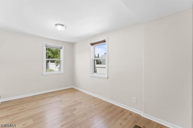 587 Jesse Pl, Union Twp, NJ 07083 - unfurnished room featuring light wood-style floors and baseboards