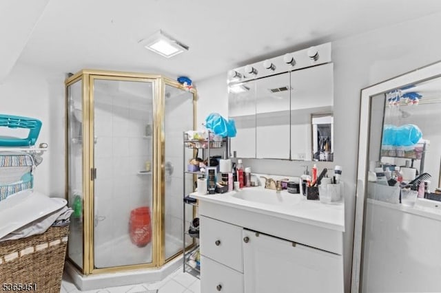 587 Jesse Pl, Union Twp, NJ 07083 - bathroom with vanity, a stall shower, and tile patterned floors