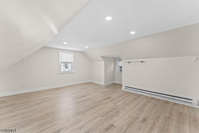 587 Jesse Pl, Union Twp, NJ 07083 - additional living space with a baseboard radiator, light wood-type flooring, lofted ceiling, and recessed lighting
