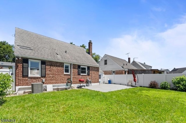 587 Jesse Pl, Union Twp, NJ 07083 - back of house with a patio, brick siding, and roof with shingles