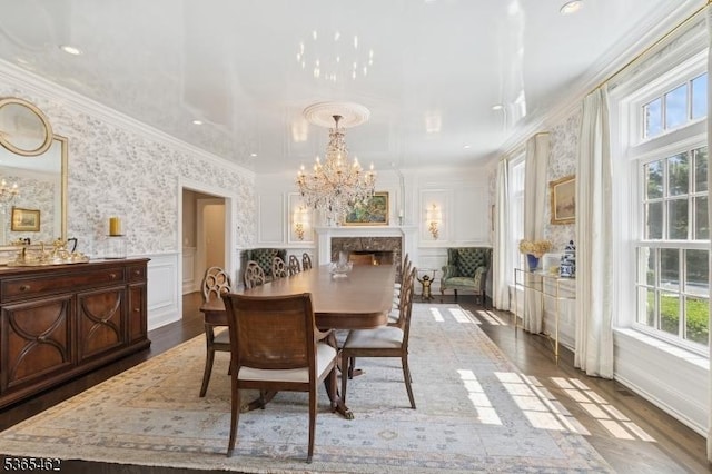 119 Mosle Rd, Mendham Twp, NJ 07945 - dining space with a chandelier, wood finished floors, a wainscoted wall, crown molding, and a decorative wall