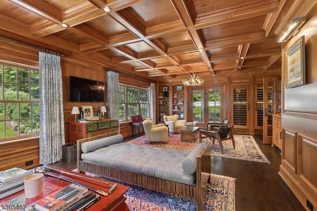 119 Mosle Rd, Mendham Twp, NJ 07945 - living area with a wooden ceiling with exposed beams, wooden walls, built in shelves, a chandelier, and crown molding