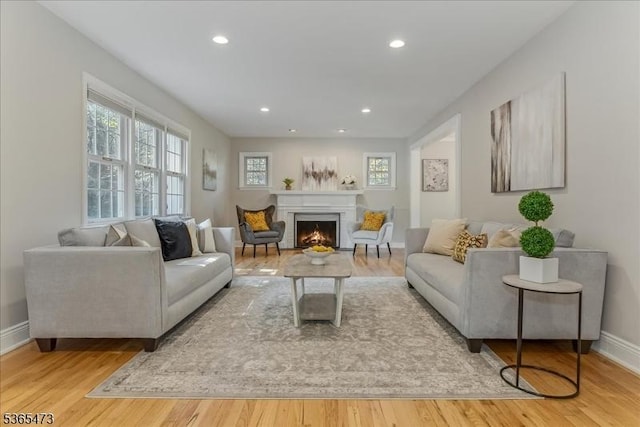 162 N Maple Ave, Bernards Twp, NJ 07920 - living room featuring wood finished floors, a warm lit fireplace, and recessed lighting