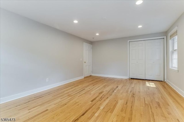 162 N Maple Ave, Bernards Twp, NJ 07920 - unfurnished bedroom featuring light wood-type flooring, recessed lighting, and a closet