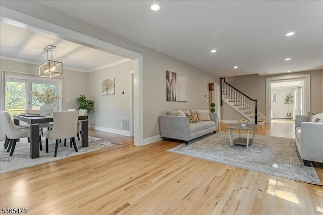 162 N Maple Ave, Bernards Twp, NJ 07920 - living room featuring stairs, wood finished floors, a chandelier, ornamental molding, and recessed lighting