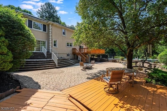 162 N Maple Ave, Bernards Twp, NJ 07920 - wooden terrace featuring stairway, a patio, outdoor dining space, and a jacuzzi