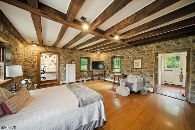 182 Musconetcong River Rd, Lebanon Twp, NJ 07882 - bedroom featuring beam ceiling, hardwood / wood-style floors, multiple windows, and baseboard heating