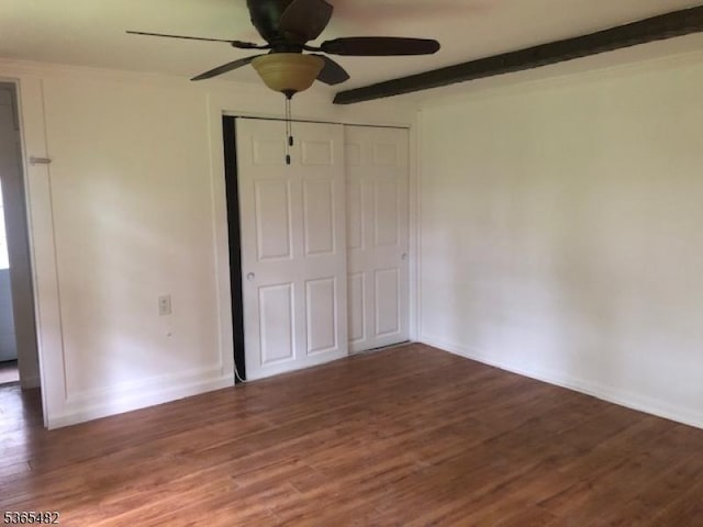 6 Mountain Ave, Mount Olive Twp, NJ 07836 - unfurnished bedroom featuring wood finished floors, a closet, ceiling fan, and beamed ceiling