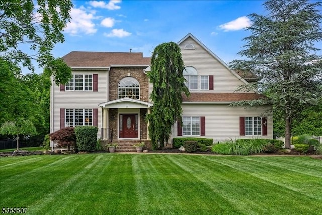 33 Gates Pl, Wayne Twp, NJ 07470 - view of front facade with a front yard
