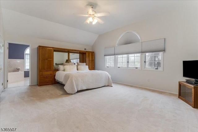 33 Gates Pl, Wayne Twp, NJ 07470 - bedroom featuring multiple windows, light carpet, lofted ceiling, ceiling fan, and ensuite bathroom