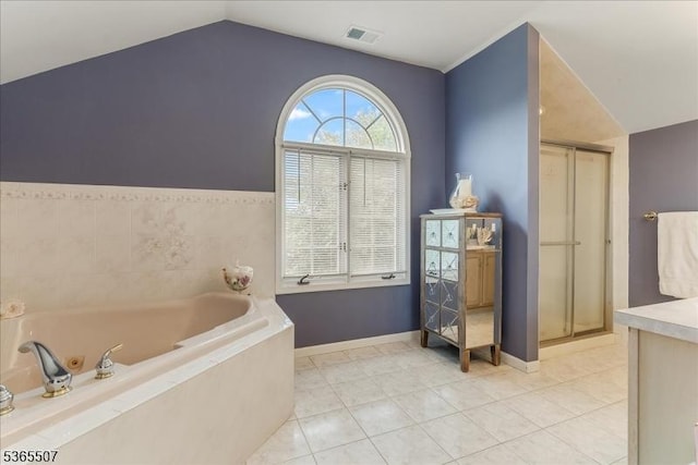 33 Gates Pl, Wayne Twp, NJ 07470 - full bathroom featuring lofted ceiling, a jetted tub, tile patterned flooring, and a shower with door