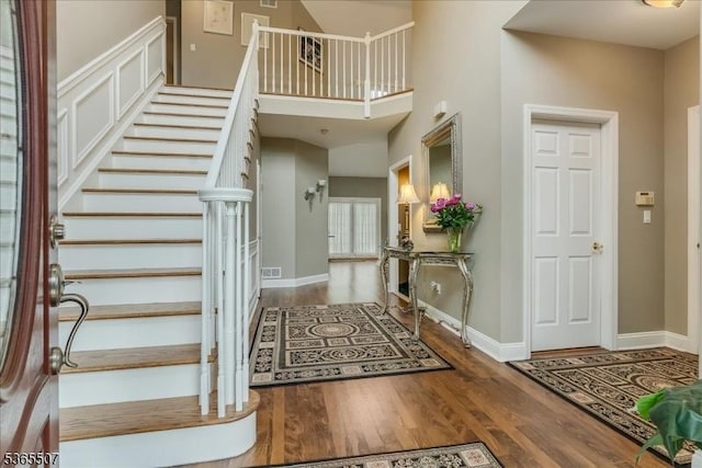 33 Gates Pl, Wayne Twp, NJ 07470 - entryway featuring wood finished floors and stairs