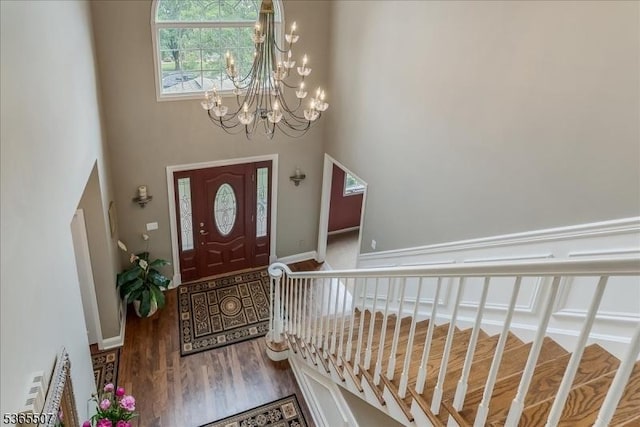 33 Gates Pl, Wayne Twp, NJ 07470 - foyer with a chandelier, a towering ceiling, wood finished floors, and stairway