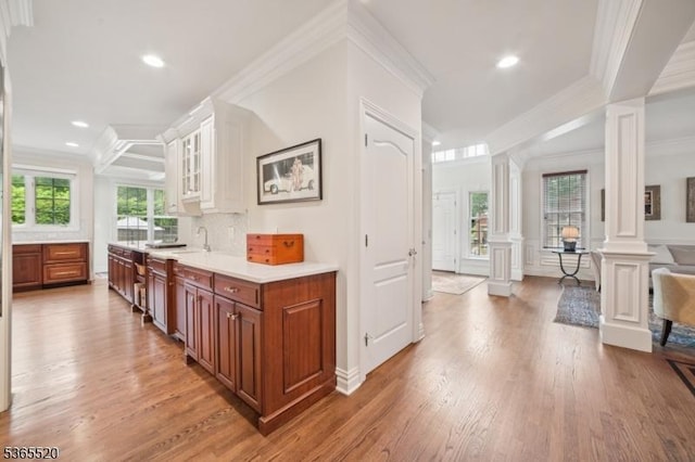 27 Green Way, New Providence Boro, NJ 07974 - bar featuring decorative columns, light wood-style flooring, crown molding, recessed lighting, and decorative backsplash