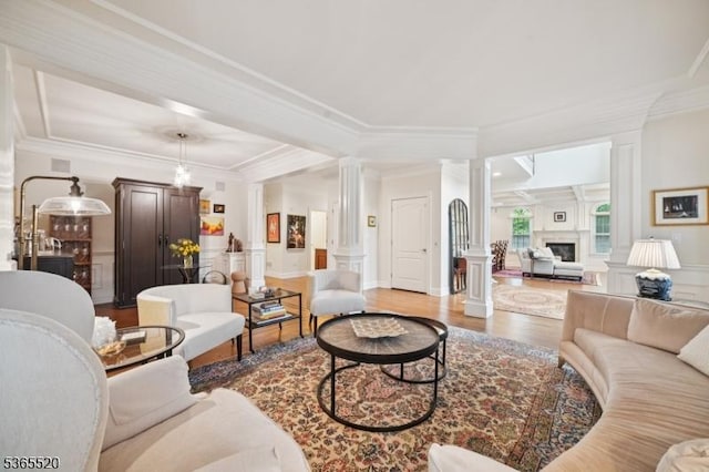 27 Green Way, New Providence Boro, NJ 07974 - living area with decorative columns, crown molding, wood finished floors, and a fireplace