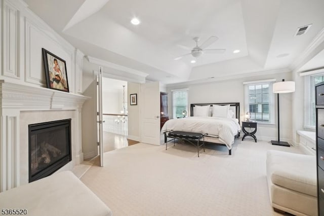 27 Green Way, New Providence Boro, NJ 07974 - bedroom featuring a raised ceiling, a premium fireplace, multiple windows, ornamental molding, and ceiling fan
