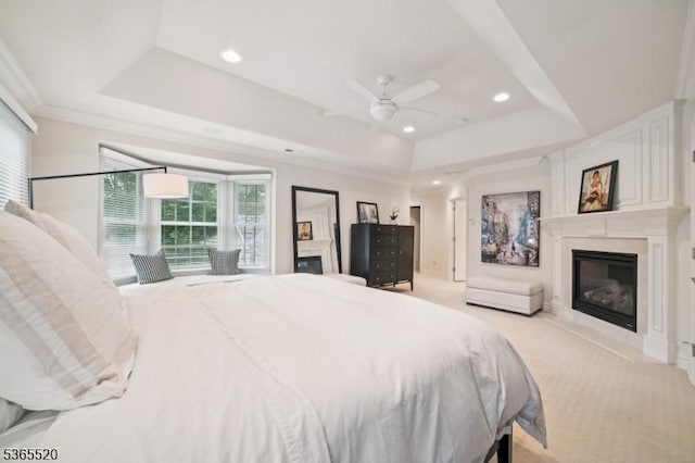 27 Green Way, New Providence Boro, NJ 07974 - bedroom with a raised ceiling, a glass covered fireplace, light carpet, recessed lighting, and ornamental molding