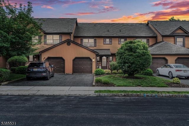 11 Manor Dr, Hillsborough Twp, NJ 08844 - townhome / multi-family property with an attached garage and asphalt driveway
