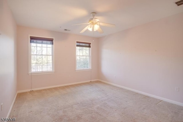 13 Ridgeview Ln Unit 13, Mount Arlington Boro, NJ 07856 - unfurnished room with a ceiling fan and light carpet