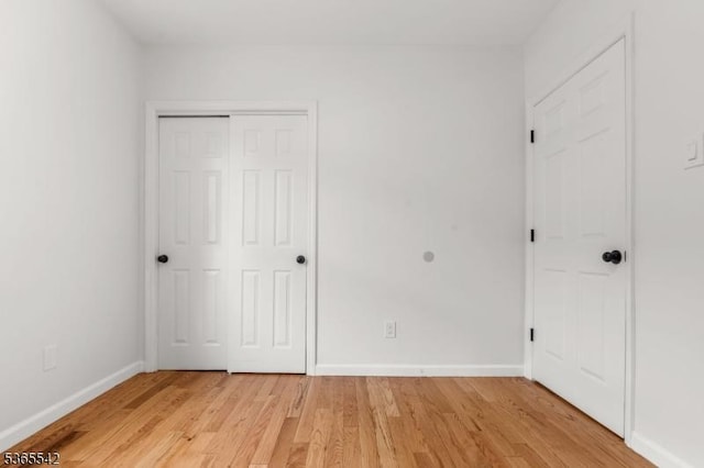 98 S Burnett St, East Orange City, NJ 07018 - unfurnished bedroom with light wood-type flooring and a closet