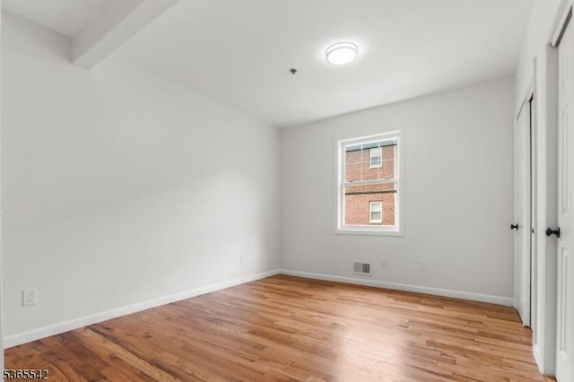 98 S Burnett St, East Orange City, NJ 07018 - spare room featuring light wood-style flooring and baseboards