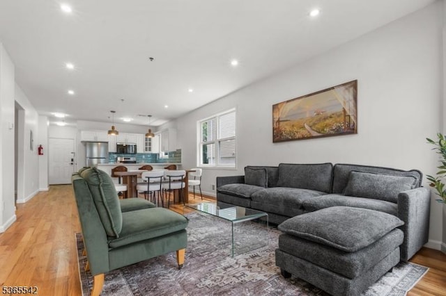 98 S Burnett St, East Orange City, NJ 07018 - living area featuring recessed lighting and light wood-type flooring
