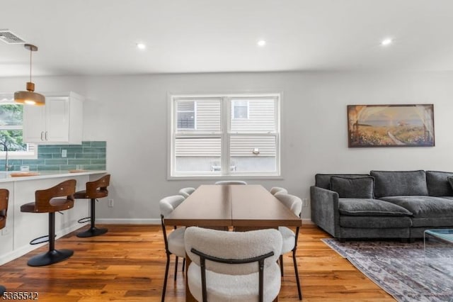 98 S Burnett St, East Orange City, NJ 07018 - dining space with light wood-type flooring and recessed lighting