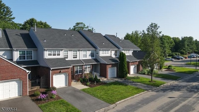 1203 Magnolia Ct, Washington Twp, NJ 07840 - multi unit property featuring asphalt driveway, brick siding, a garage, and a shingled roof