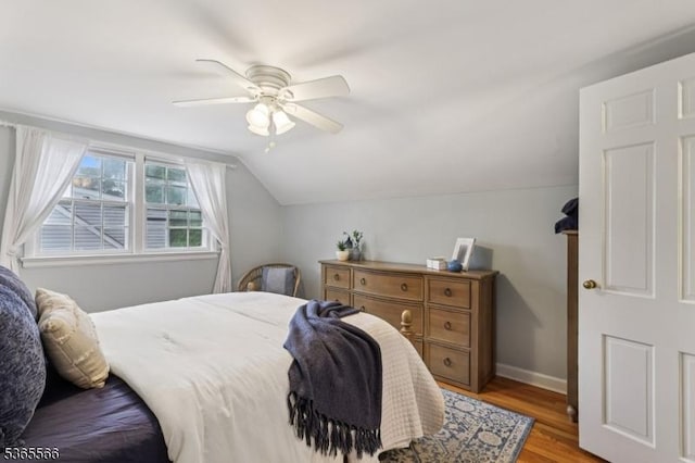 942 Summit Ave, Westfield Town, NJ 07090 - bedroom featuring wood finished floors, vaulted ceiling, and ceiling fan