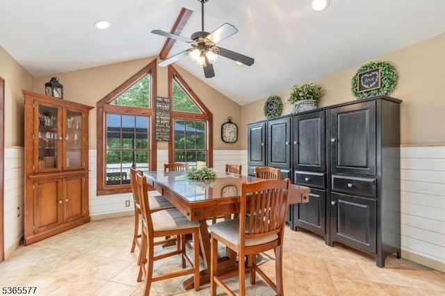 114 Fawn Ridge Dr, Long Hill Twp, NJ 07946 - dining room with a ceiling fan, wainscoting, lofted ceiling, wooden walls, and light tile patterned floors